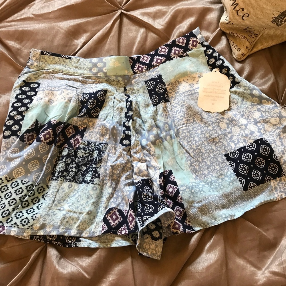 Altar’d State Flowy floral /patchwork shorts.